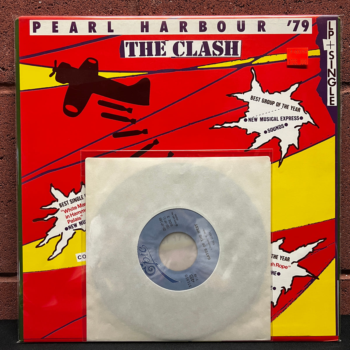 Used Vinyl: The Clash "S/T (Pearl Harbour)" LP + 7" (1979 Japanese Issue)
